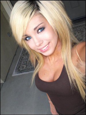 18 tear old schoolgirl Tiff Bannister takes selfies while disrobing in bedroom